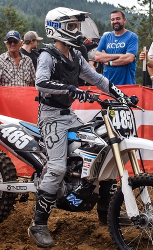 motocross rider with full gear and chest protector